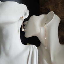 Charger l&#39;image dans la galerie, Duo de boucles d&#39;oreilles en perles, comprenant un modèle court avec perle unique et un modèle long à double chaîne, adapté à différents styles.
