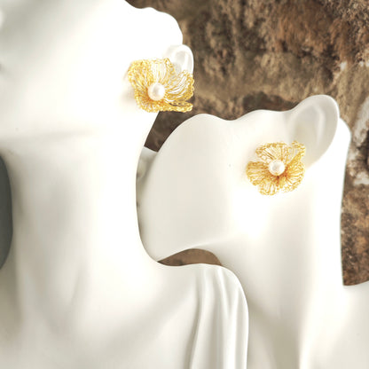 Boucles d'oreilles faites main en fil métallique avec des designs délicats, ornées de perles