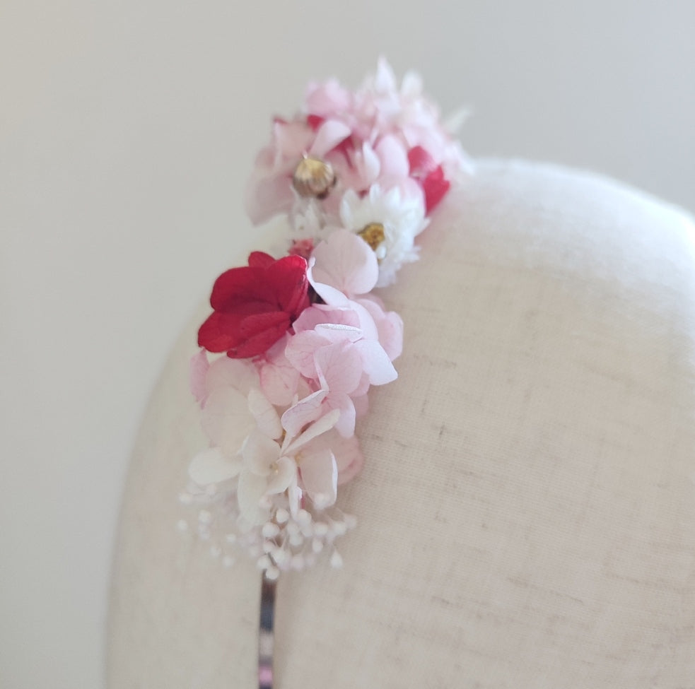 Serre-tête floral Quatre Saisons, Printemps, avec fleurs stabilisées rose et blanc.