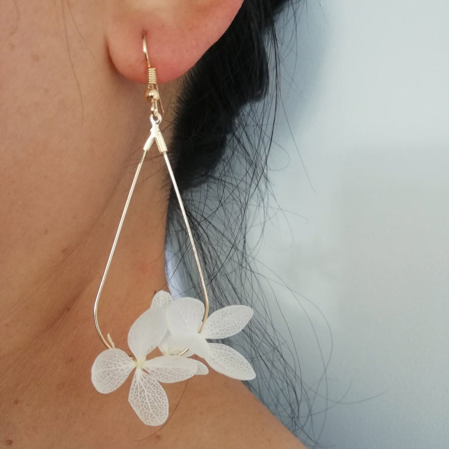 Boucle d'oreilles vert en fleurs séchées