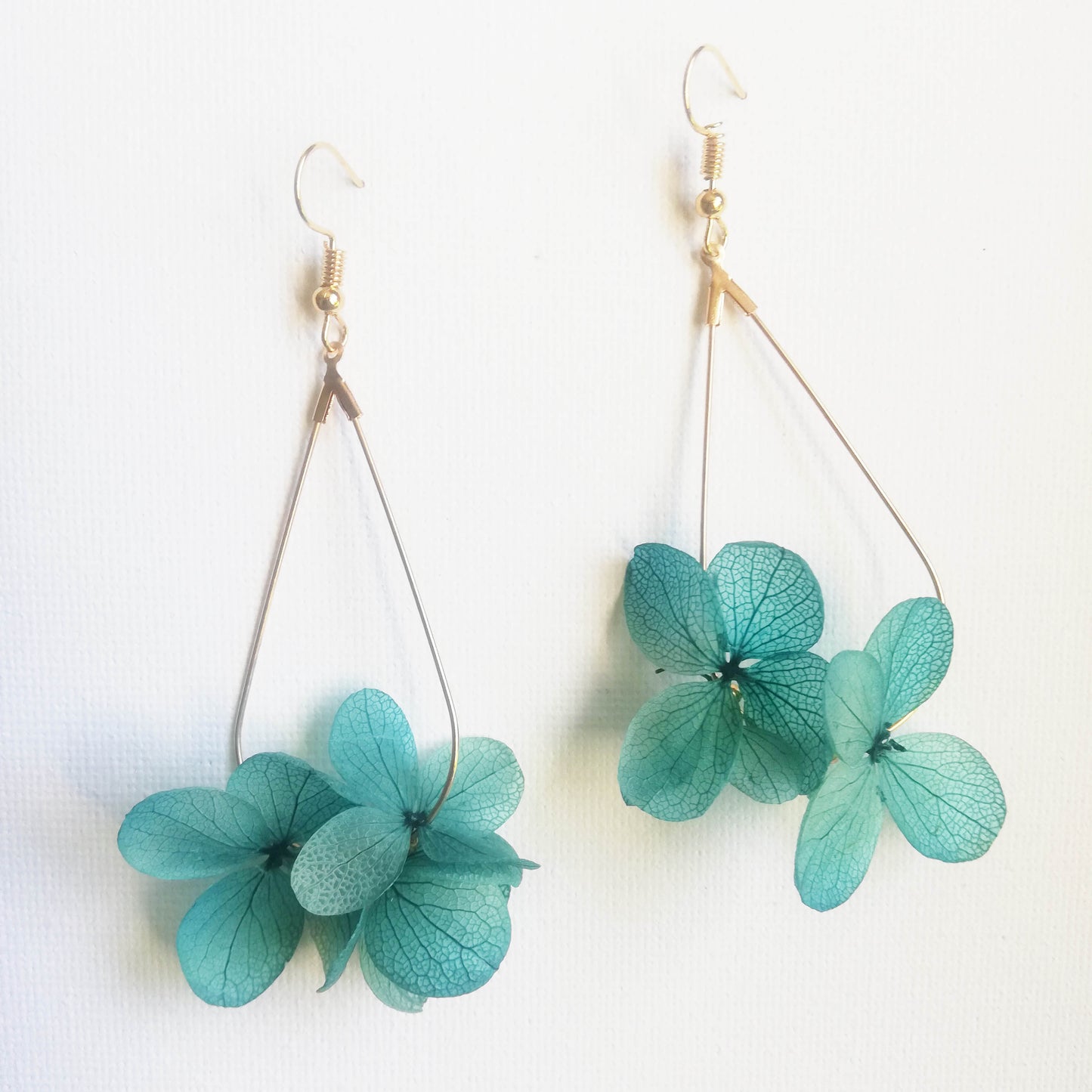 Boucle d'oreilles vert en fleurs séchées