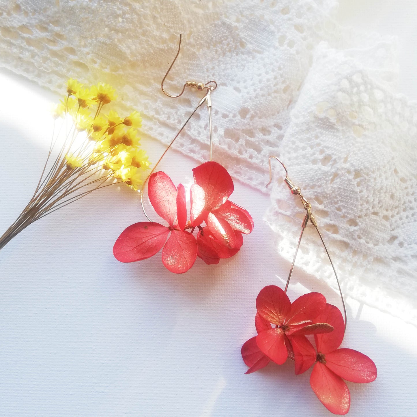 Boucle d'oreilles vert en fleurs séchées