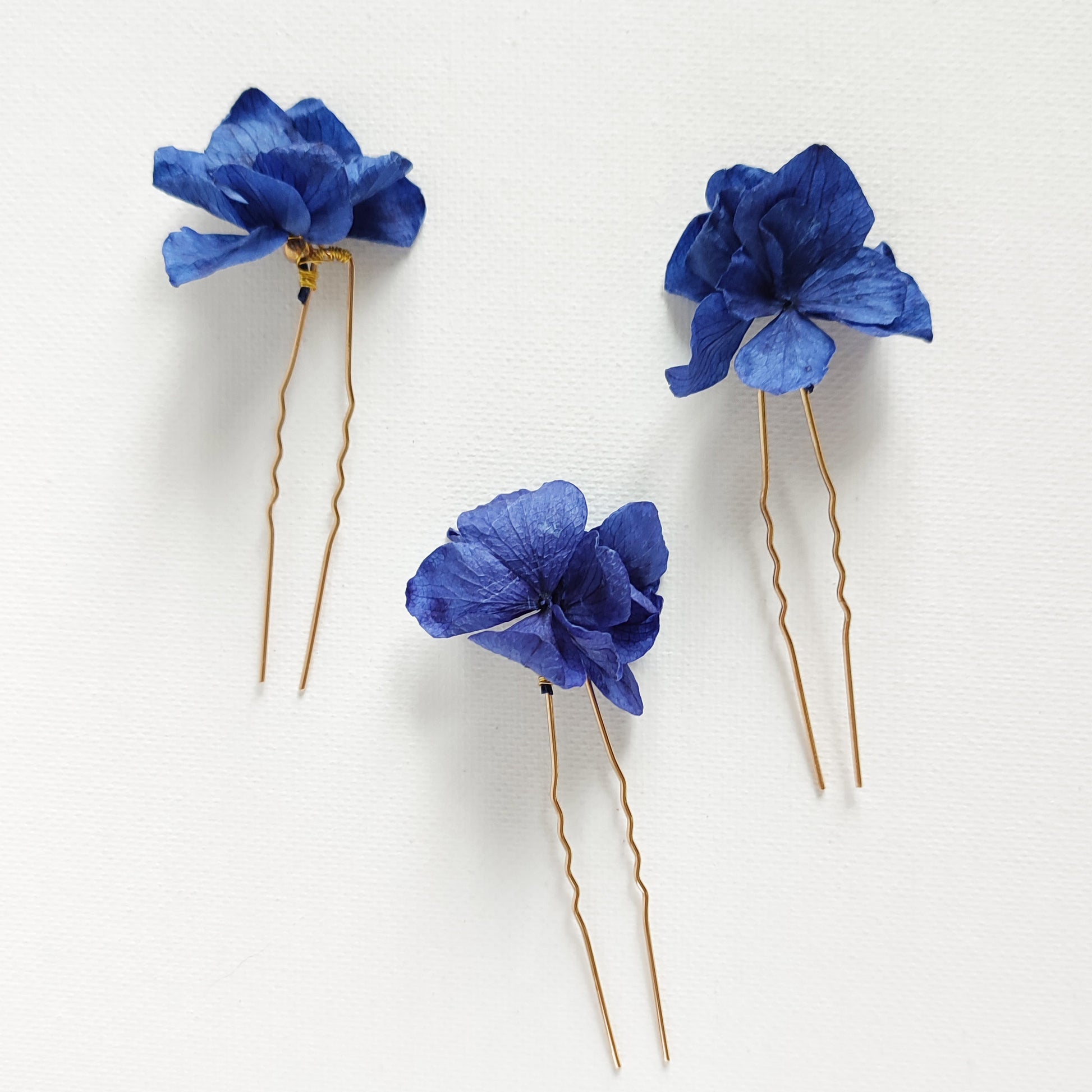 peigne bleu floral à cheveux